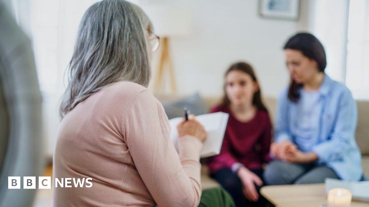 Doctor and patient with parent