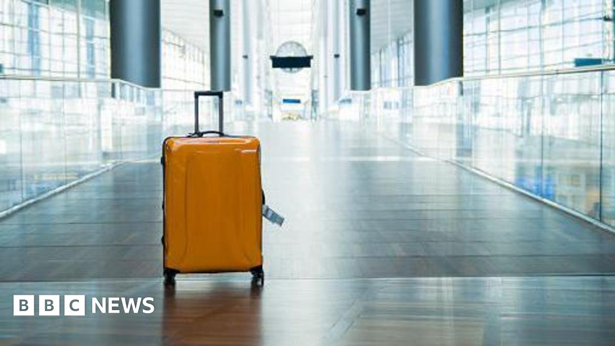 New Zealand woman arrested after two-year-old found in luggage