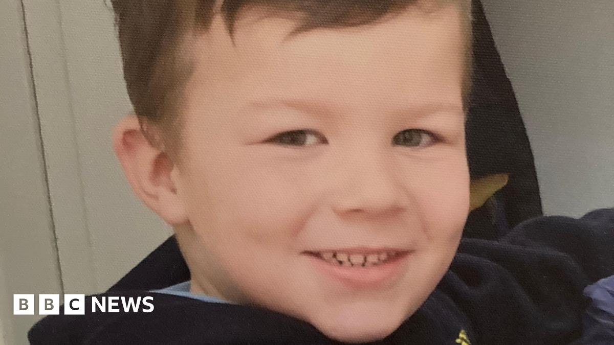 Caio, the victim of a dog attack, smiling at the camera