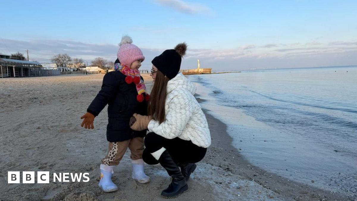 
                            Under fire from the sea, Ukrainian families in Odesa try to escape Russian barrage