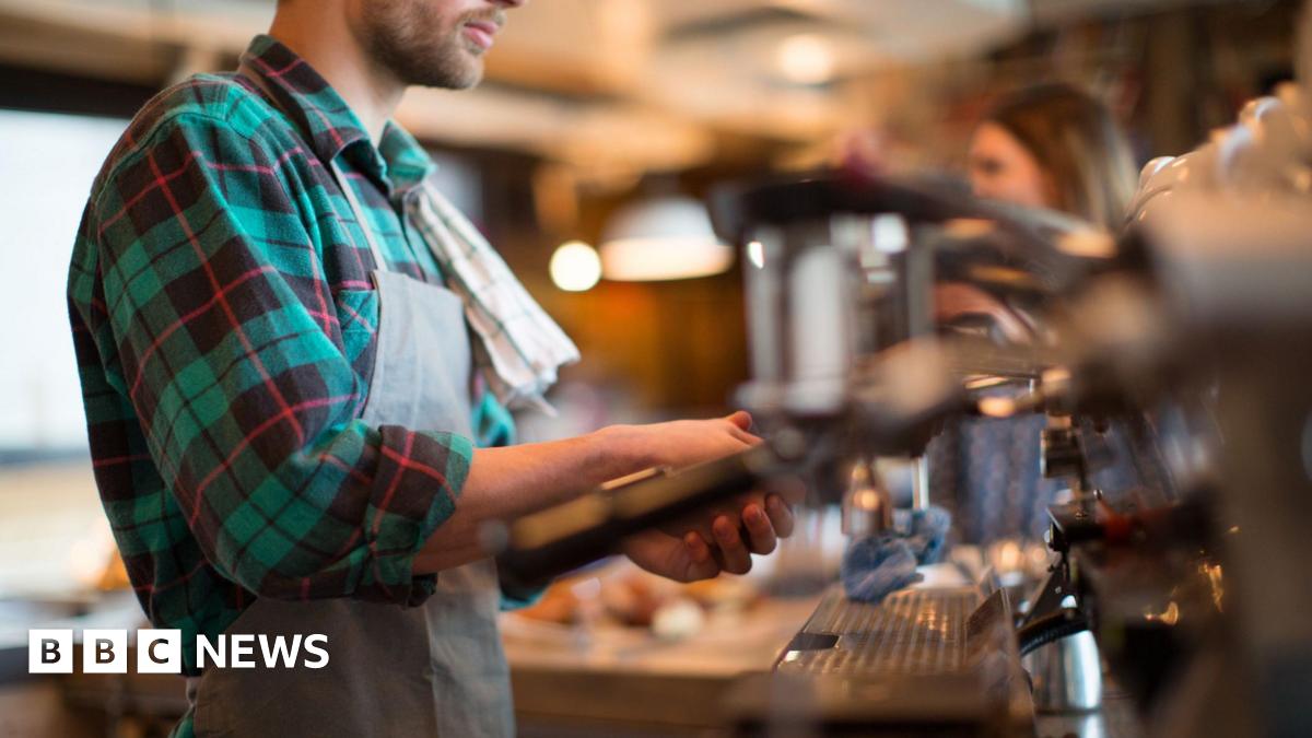 man working in a coffee shop