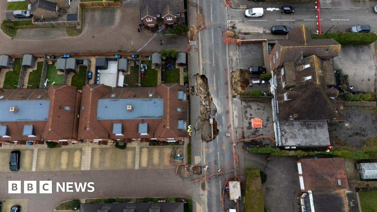 Man, 87, 'staying put' in home near sinkhole