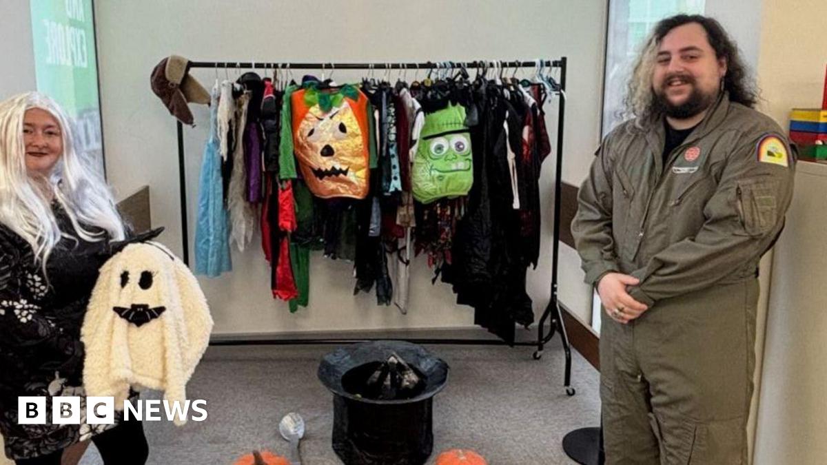 Used children's Halloween costumes on display for swap in Dudley