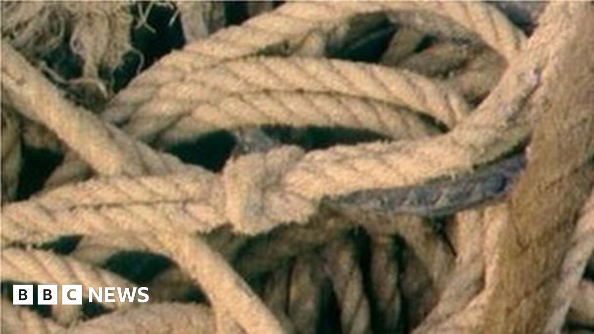 Neath cyclist stuck in mud: Woman rescued with ropes - BBC News