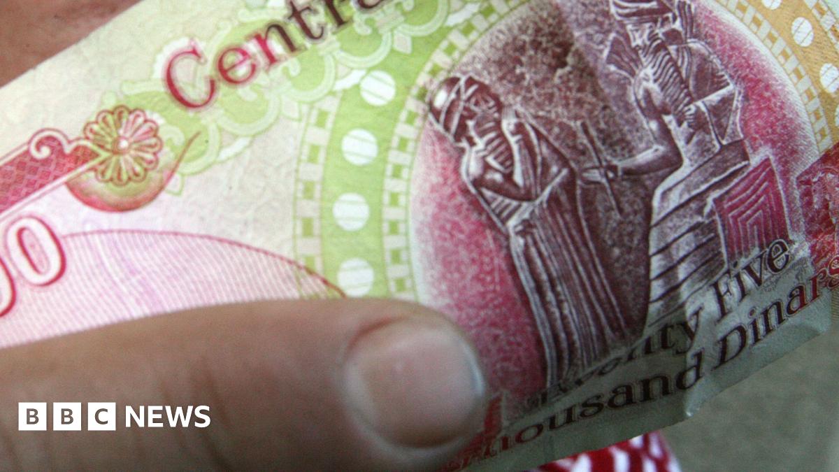 A photograph of a dinar note, symbolizing the currency's rich history