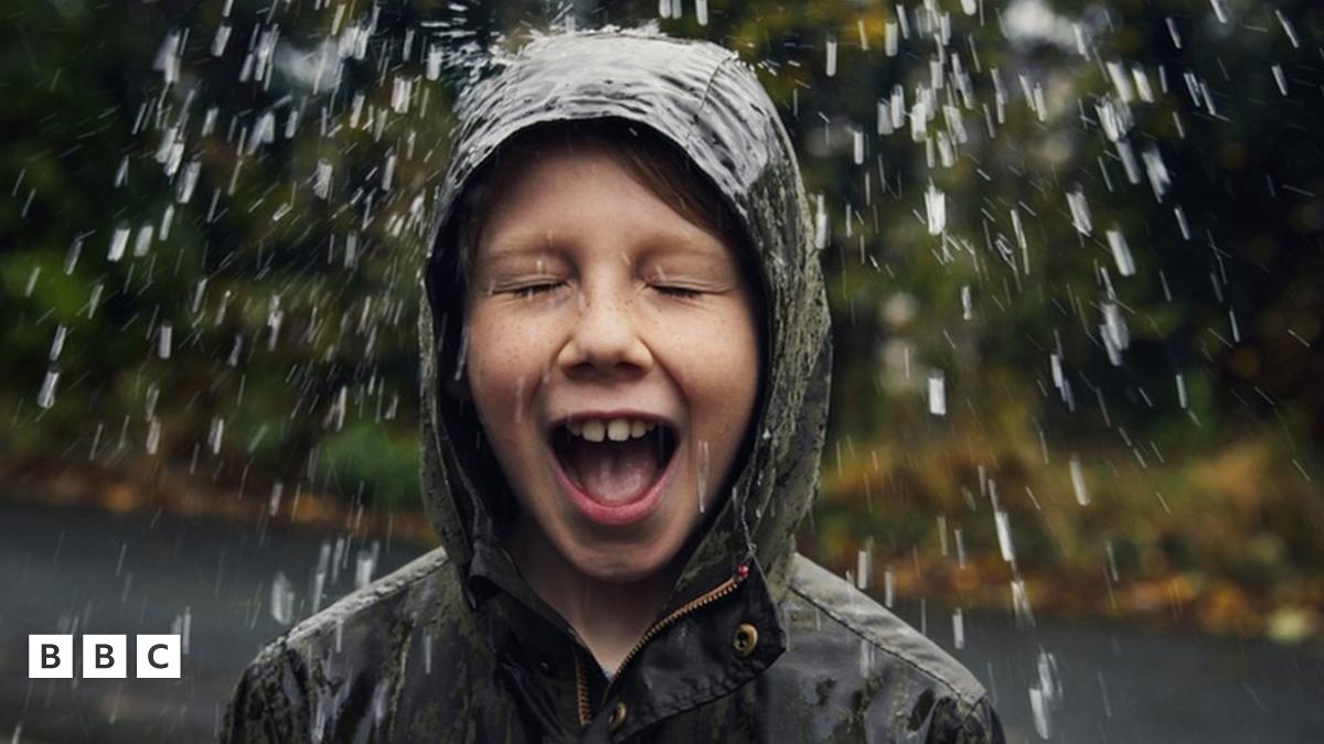 child out in the rain