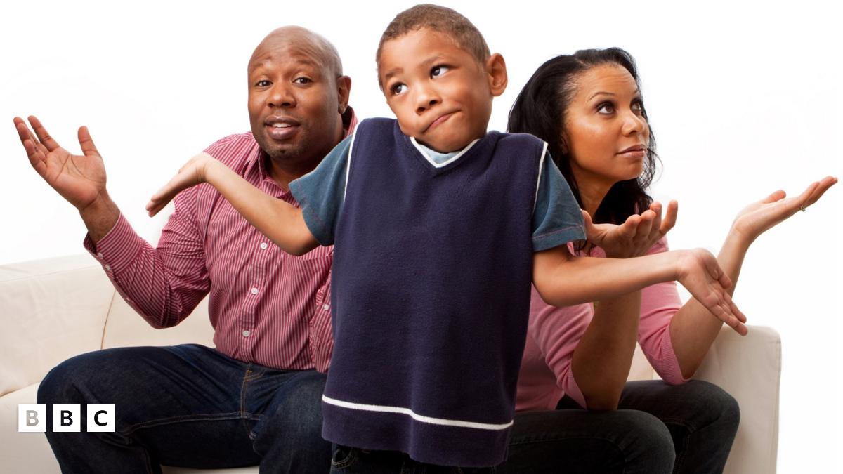 A family all shrug and look confused