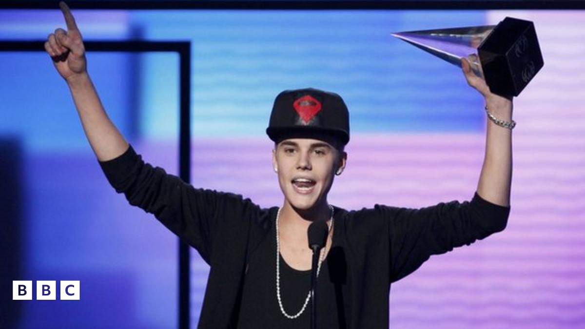 Justin Bieber wins three American Music Awards BBC Newsround