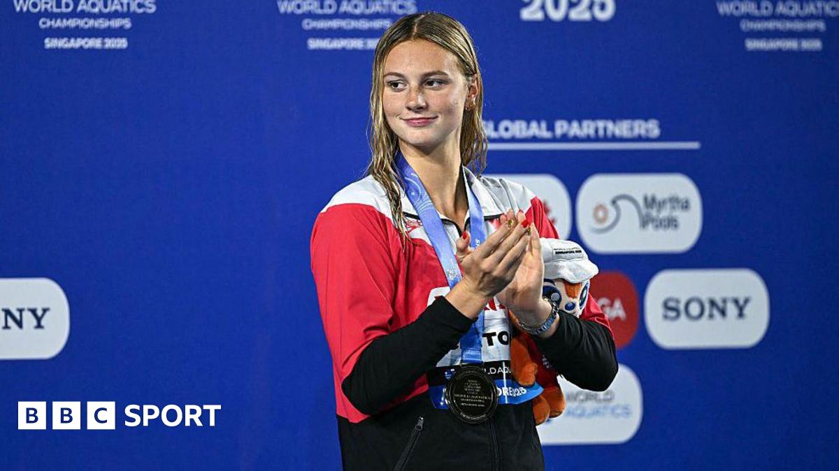 McIntosh wins fourth gold, medley double for Marchand