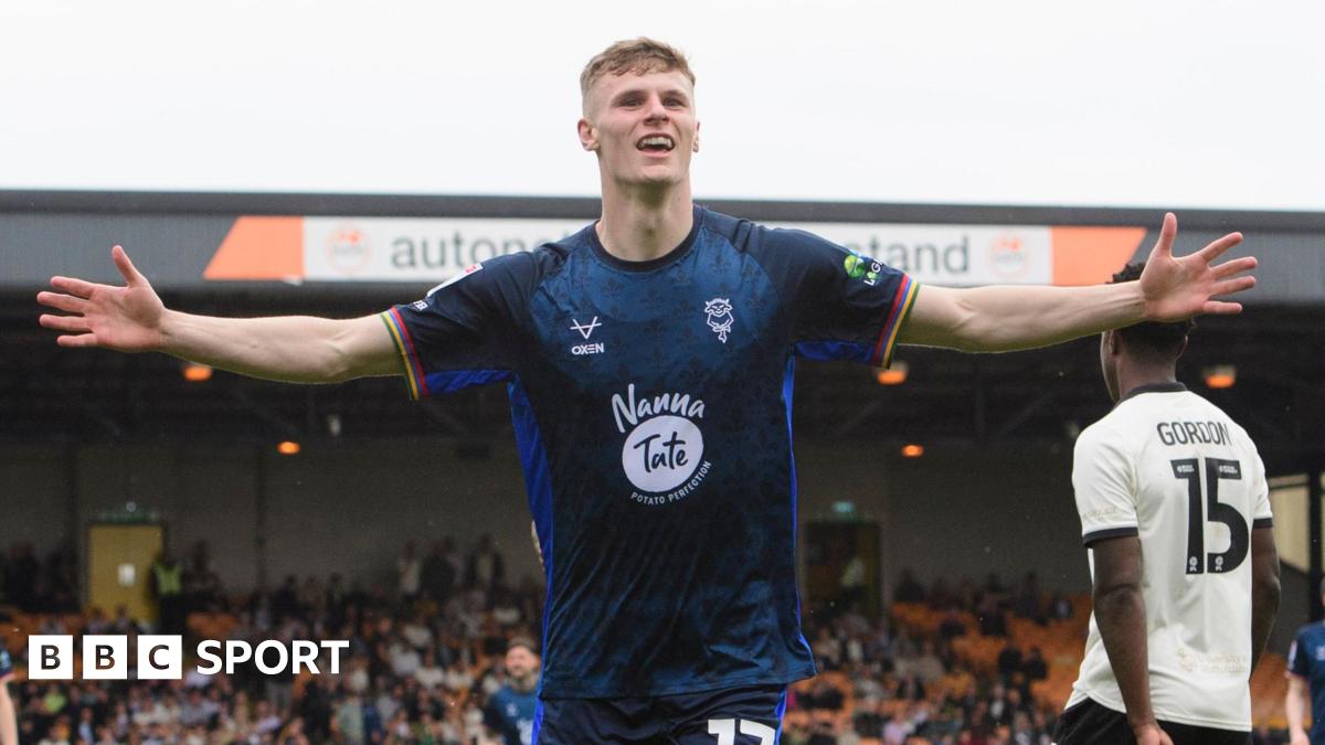 Lincoln City end historic season with 29-game unbeaten run after 2-0 win at Port Vale