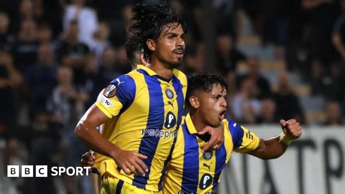 **Headline:** The absence of Maccabi Tel Aviv's devoted fan base may cast a shadow over their highly anticipated Europa League clash against Aston Villa, potentially disrupting the balance and electric atmosphere at Villa Park.