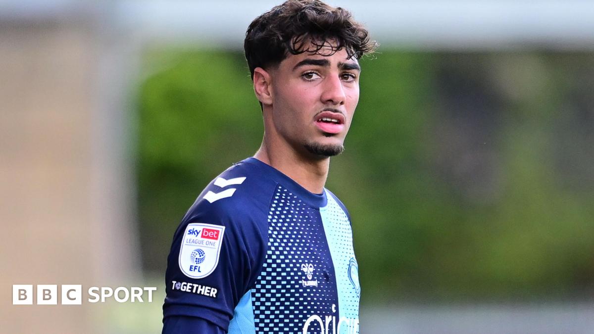 George Abbott: Tottenham midfielder relishes Mansfield Town move - BBC