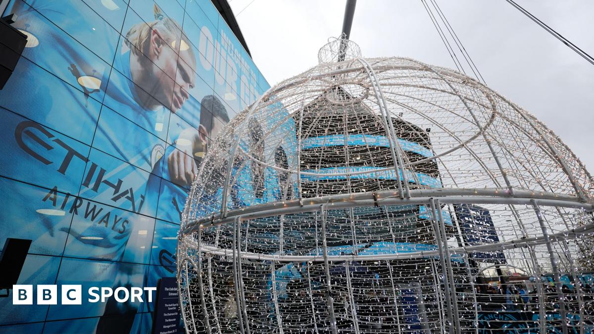 Premier League match action with Brentford players challenging for the ball