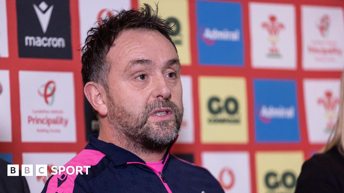 Who is new Wales caretaker head coach Sherratt?