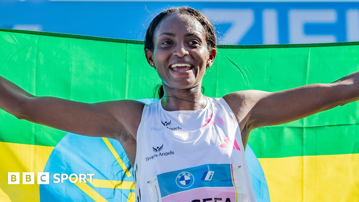 Ethiopia's Tigist Assefa celebrates her women's world record run at the 2023 Berlin Marathon