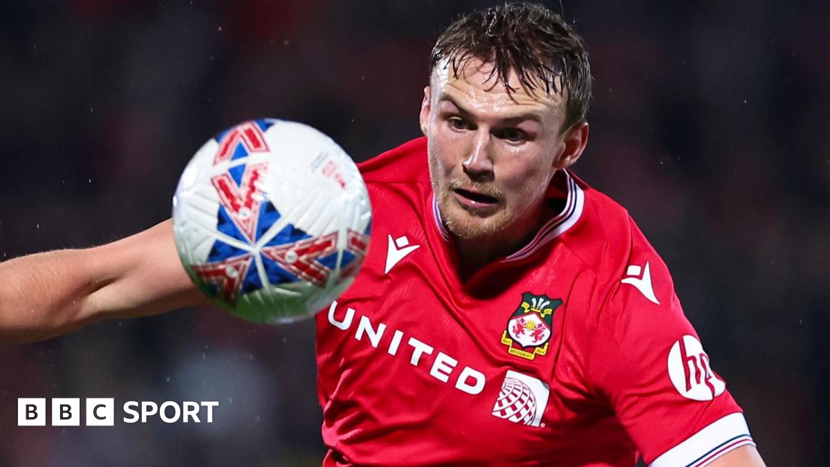Dalby and Davies leave Championship-bound Wrexham
