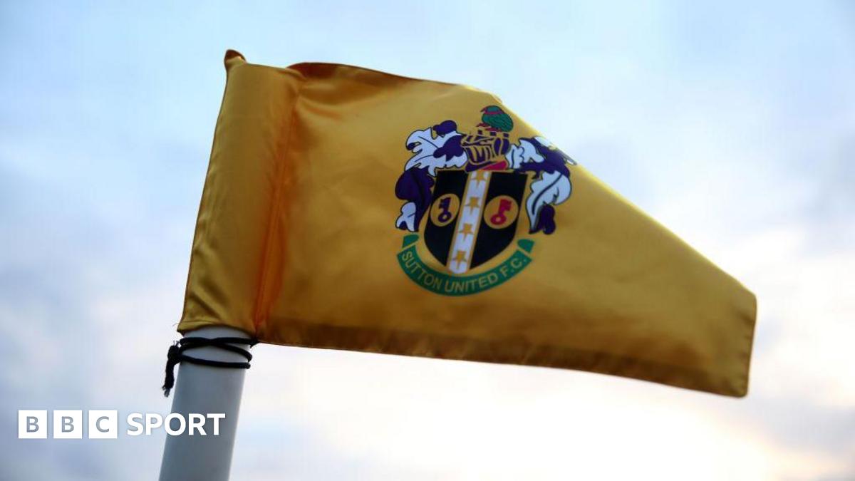The Sutton United logo on a corner flag