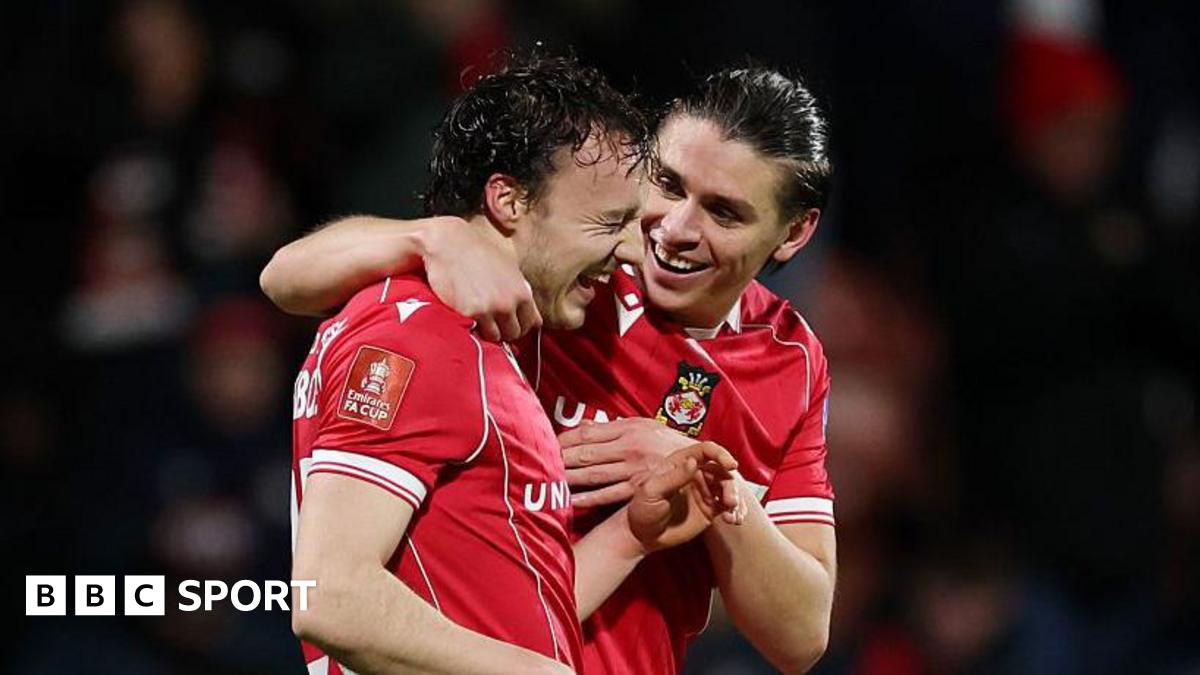 Wrexham duo Rathbone and Dobson sign new deals
