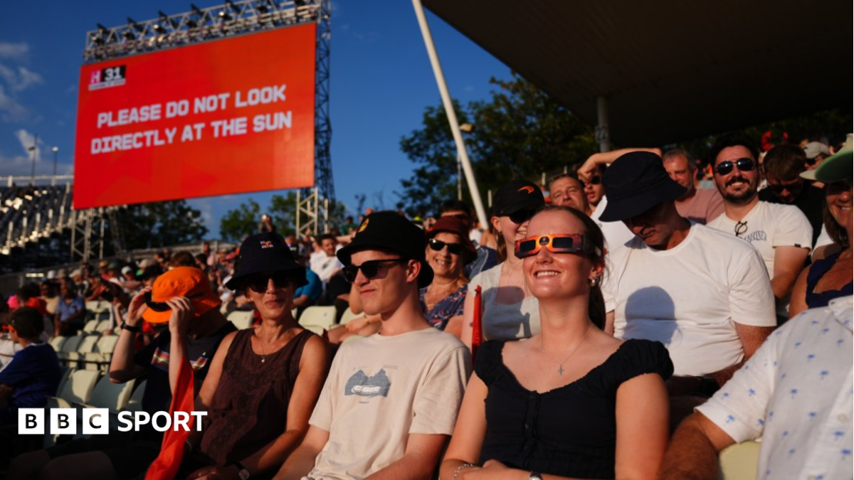 Solar eclipse distracts from sporting events - in pictures