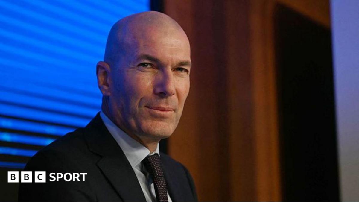 Zinedine Zidane looking on at a news conference