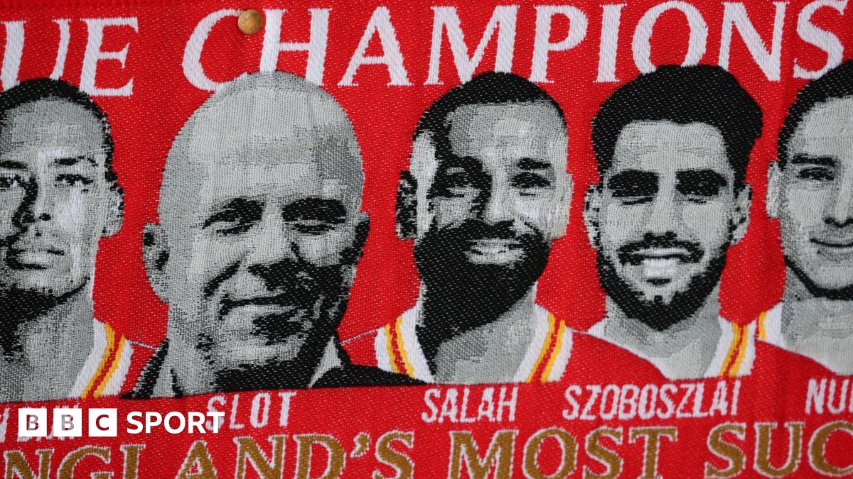 Liverpool players warming up at Anfield before a Premier League match