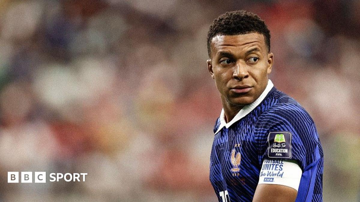 Kylian Mbappe looks on