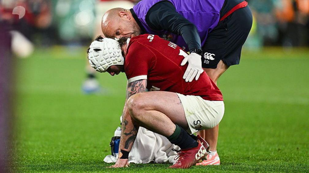 Mack Hansen receives treatment