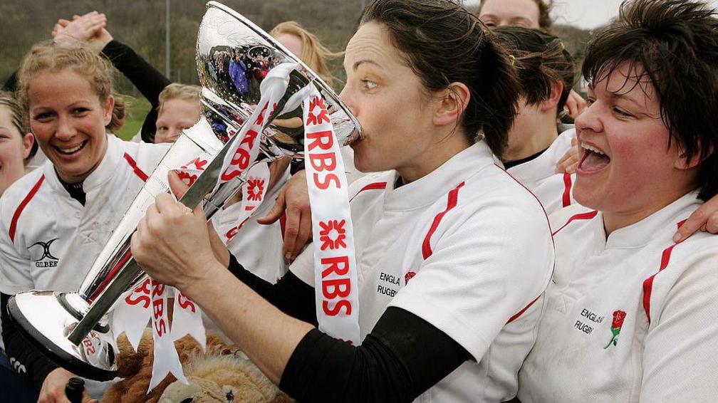Sue Day drinks from the Six Nations trophy