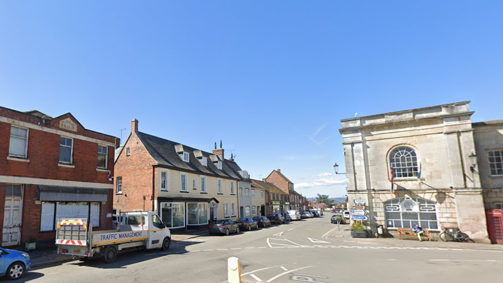 A general view of Berkeley town centre with vehicles parked along main street