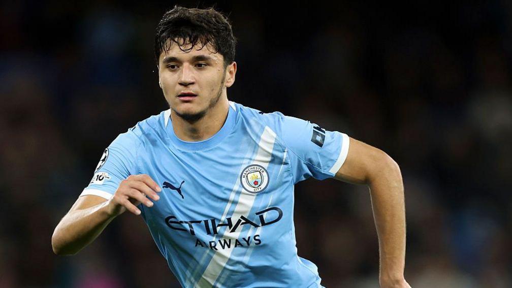 Abdukodir Khusanov in action for Manchester City