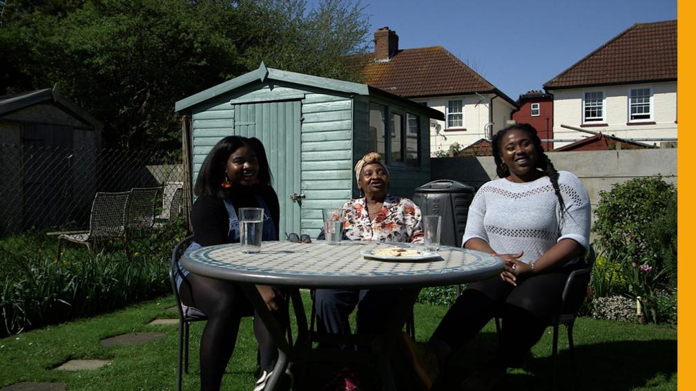 Image of 2 generations of Windrush children