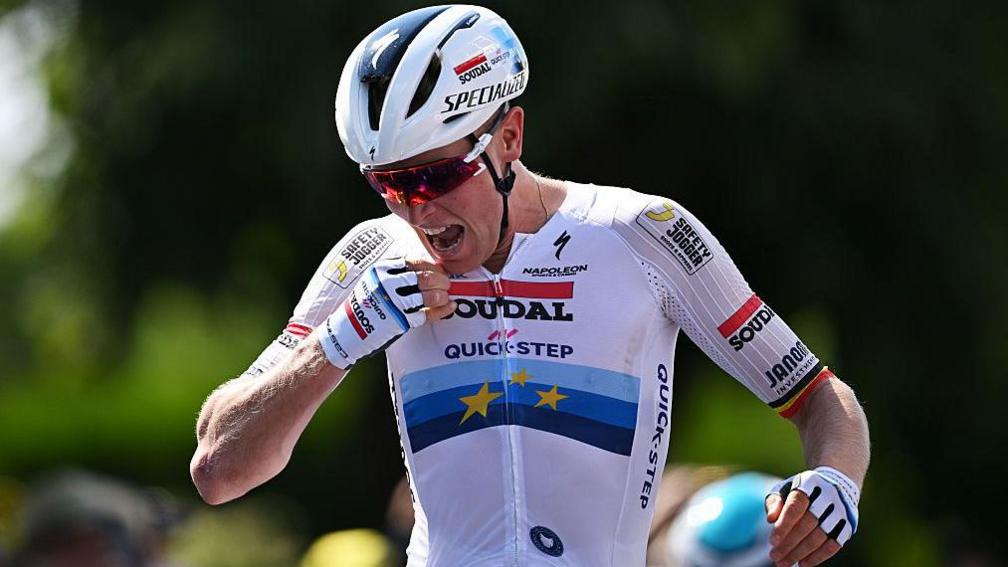 Tim Merlier celebrates
