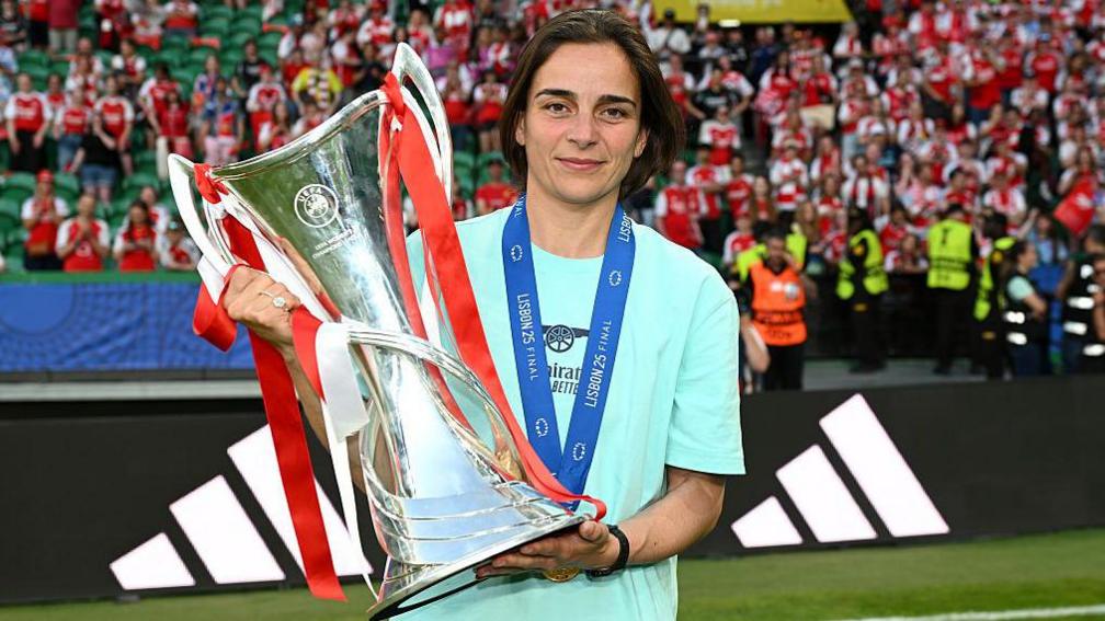 Renee Slegers, Manager of Arsenal, poses for a photograph with the UEFA Women's Champions League trophy