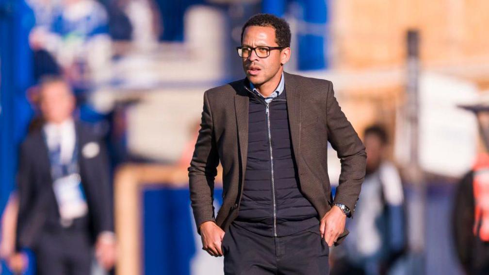 Liam Rosenior watches his team from the sidelines