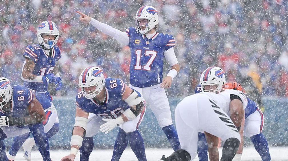 Josh Allen made more history with three touchdown passes and one rushing score in the Buffalo snow
