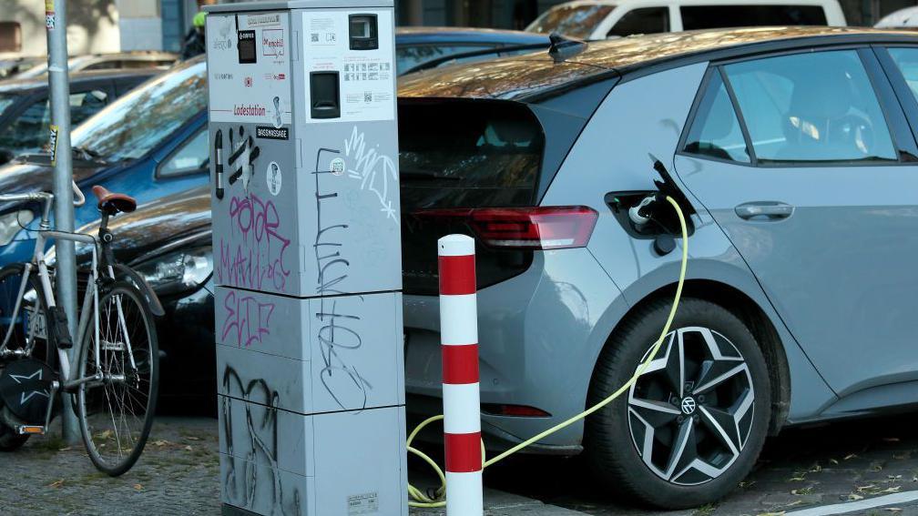 An electric car being charged in Germany 