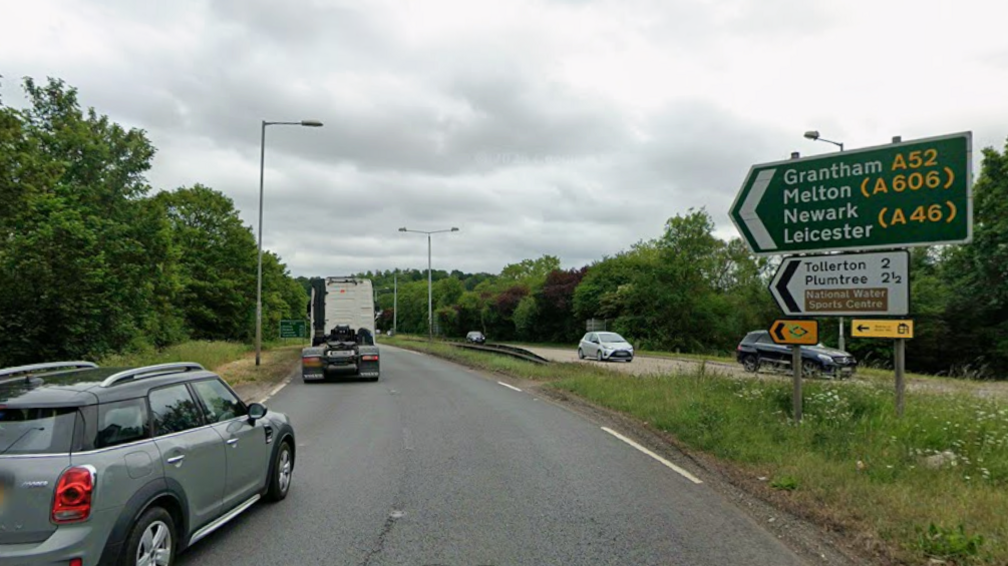 A lorry and car driving down the A52 eastbound at the Nottingham Knight roundabout in Nottinghamshire.