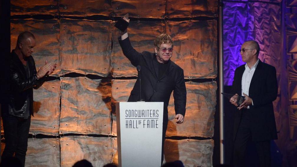 Elton John accepts the Mercer Award at the Songwriters Hall of Fame 