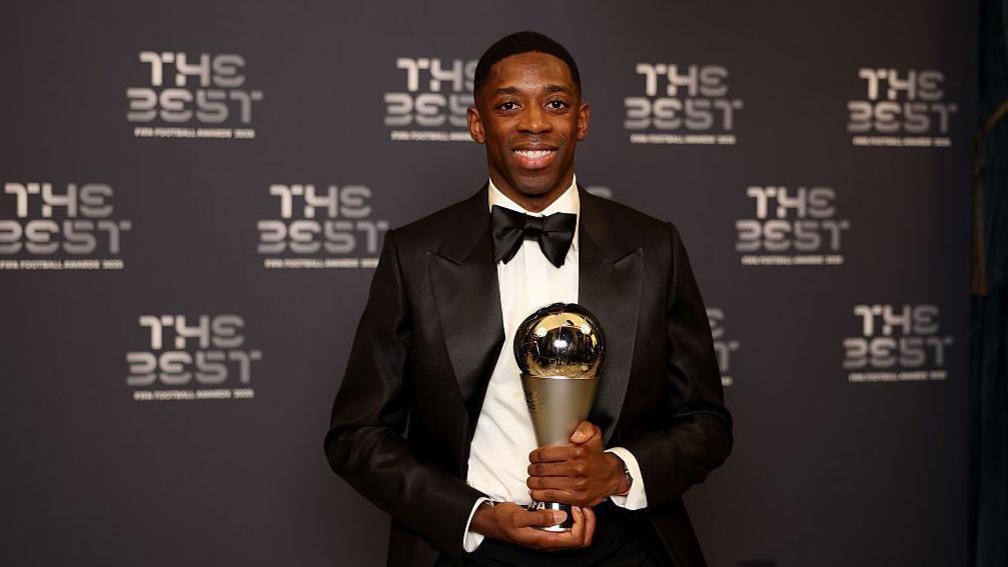 Ousmane Dembélé with his award.