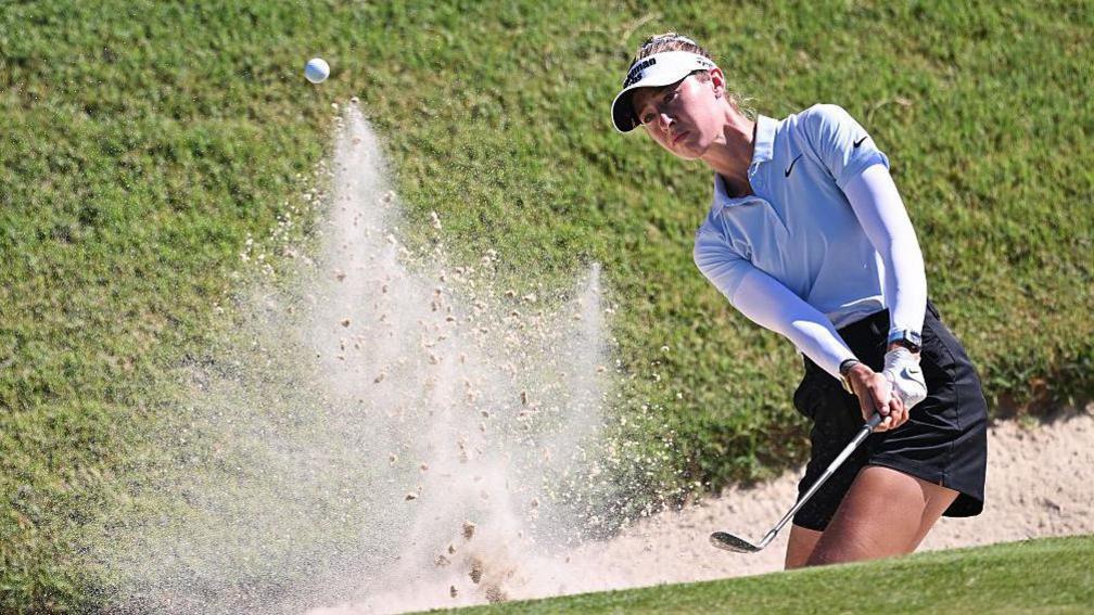Nelly Korda chips out of a bunker