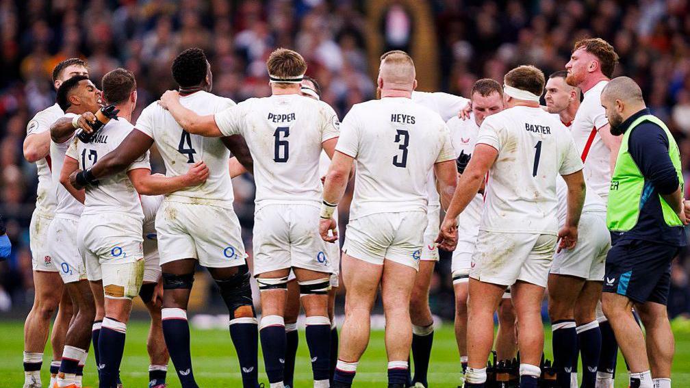 England huddle
