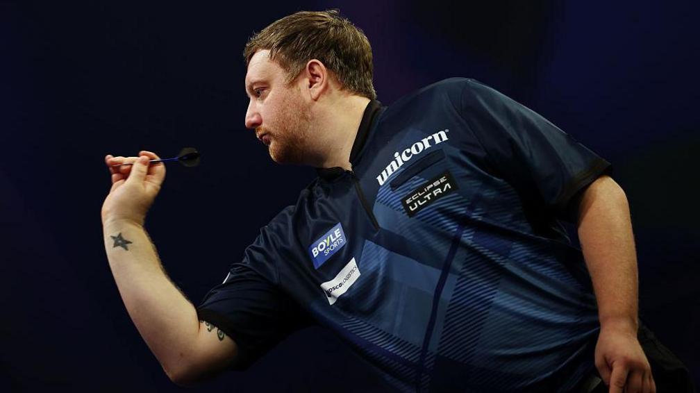 Scottish darts player Cameron Menzies