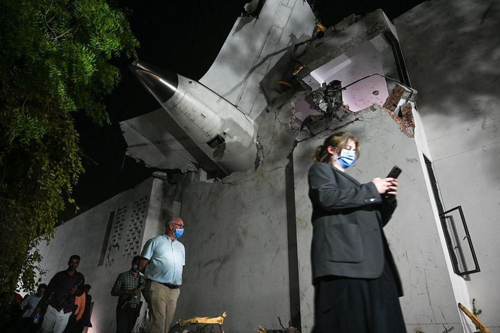 Investigation team at the site of the Air India flight crash on June 12, 2025 in Ahmedabad, India. 265 people died and many others were injured after the Air India 171 flight headed to London from Ahmedabad crashed moments after take-off. The plane crashed on a resident doctors' hostel in Ahmedabad, which suffered major damage in the accident. (Photo by Raju Shinde/Hindustan Times via Getty Images)