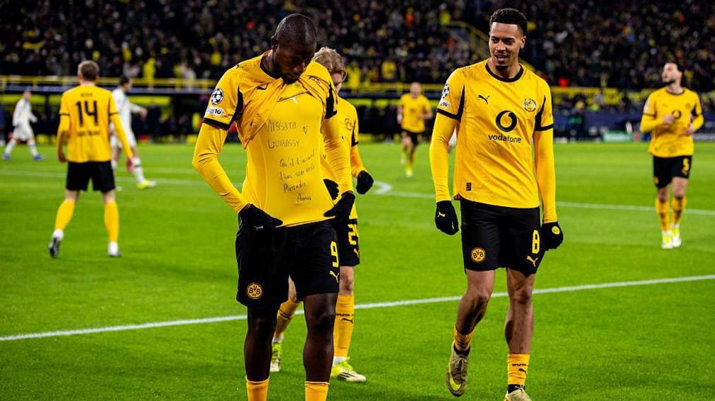 Serhou Guirassy wearing an under shirt