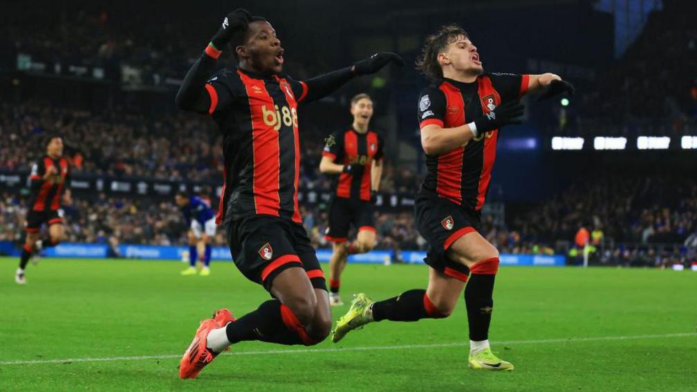 Dango Ouattara and Milos Kerkez celebrate Bournemouth's late winner