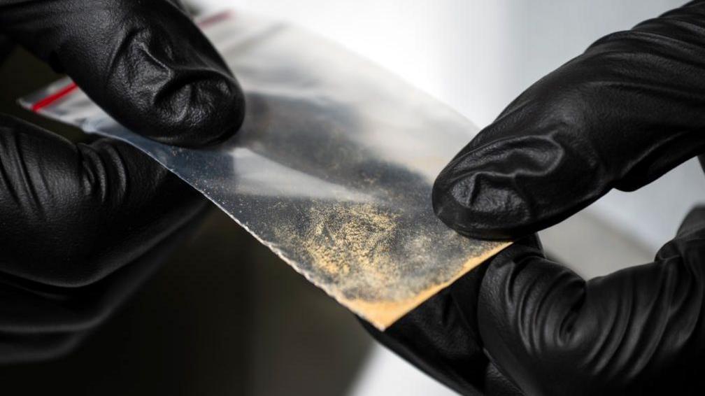 Close up of a bag of nitazene powder sample at the Center for Forensic Science Research and Education on Friday, Oct. 20, 2023