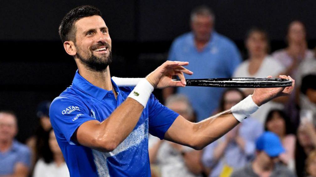 Novak Djokovic celebrates his win against Gael Monfils