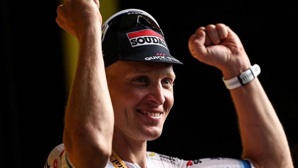 Tim Merlier celebrates