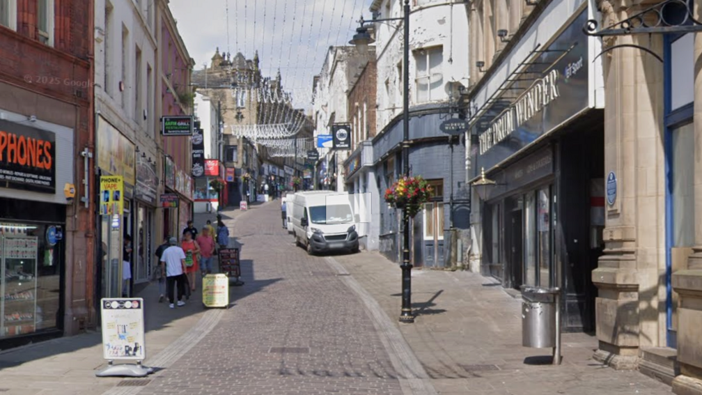 A pedestrianised shopping street in the centre of Bradford.