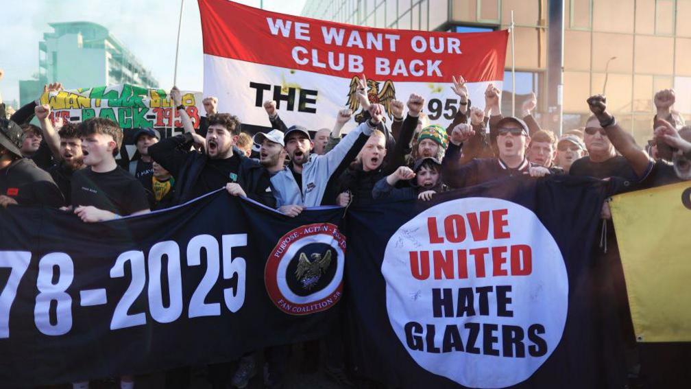 Manchester United fans protest against the club's owners